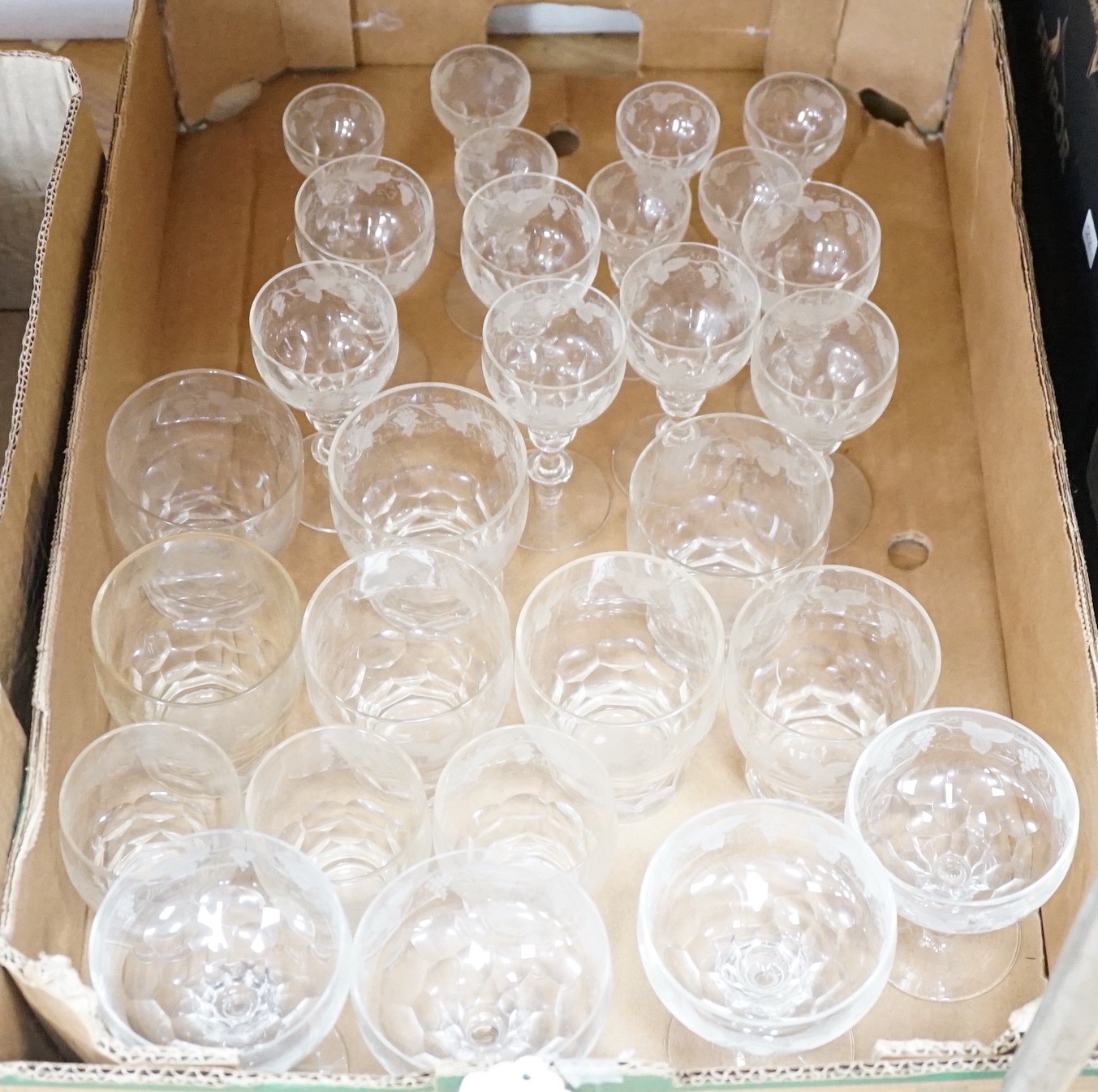 A part set of vine-etched glassware (28)